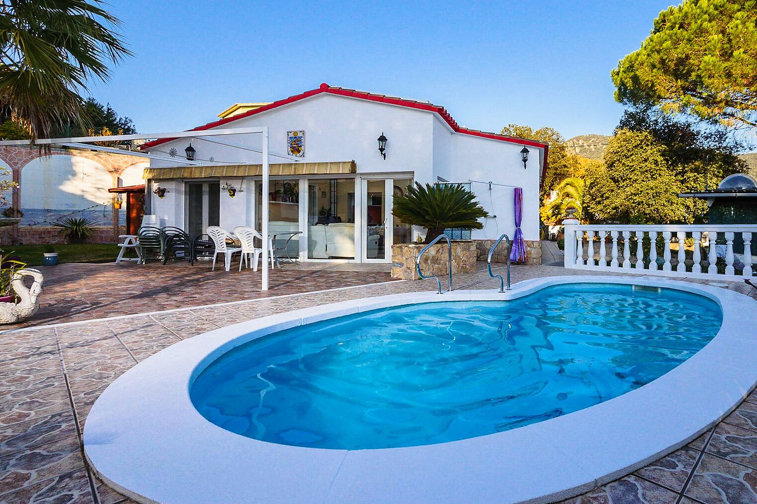 Villa individuelle de plain-pied avec piscine.